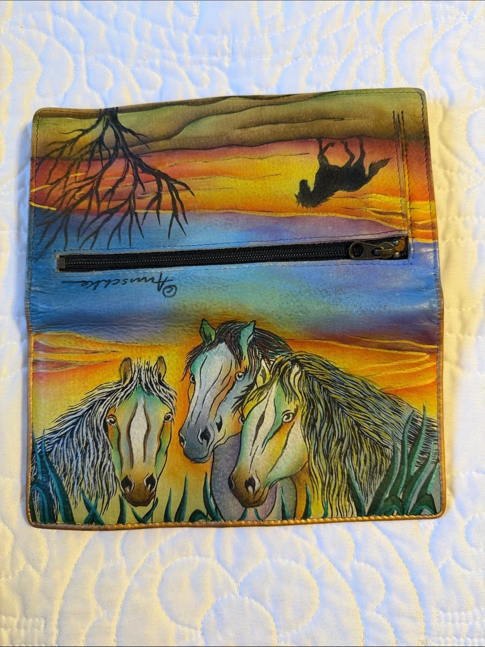 Anuschka hand-painted leather wallet featuring a vibrant 